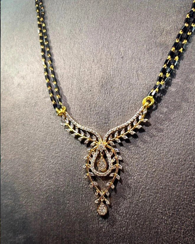 Black-bead mangalsutra with a gold and diamond-look pendant